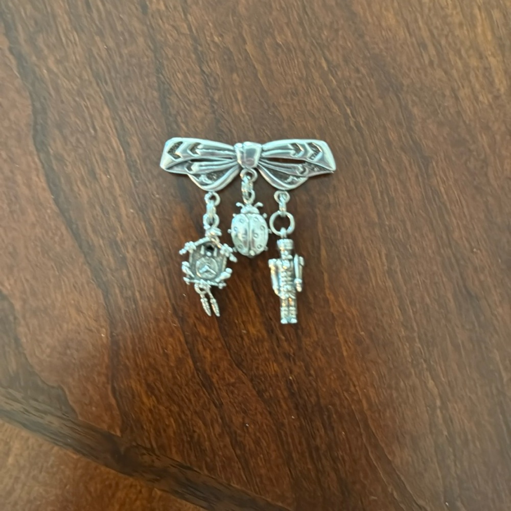 Sterling Silver Brooch with 3 German Charms